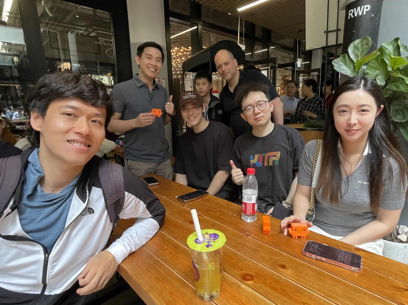 Claude Code Community Day attendees with orange Lunatechs mascots